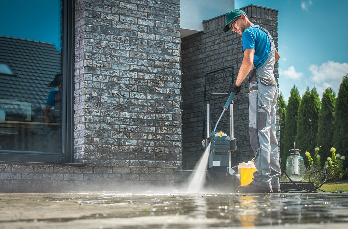Professional pressure washing house exterior cleaning.